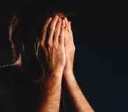 A man crying in despair