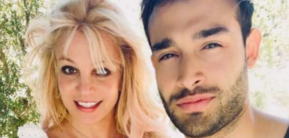 Britney Spears poses with her boyfriend Sam Asghari at their California home