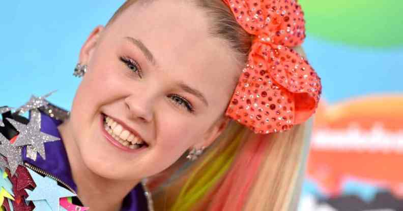 JoJo Siwa attends Nickelodeon's 2019 Kids' Choice Awards in an extremely colourful and sparkly outfit and orange giant hairbow