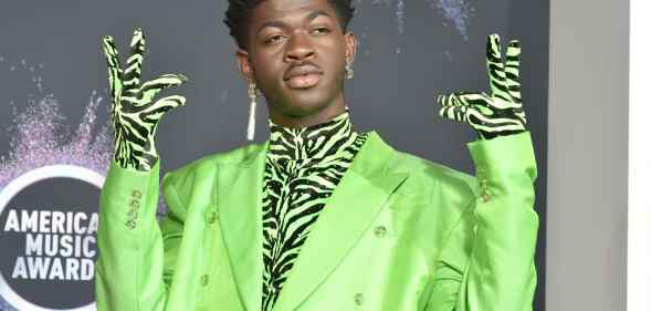 Lil Nas X wears neon green suit at the American Music Awards