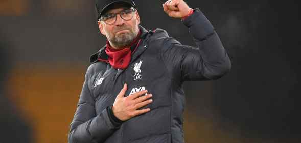Liverpool manager Jürgen Klopp raises his fist in the air