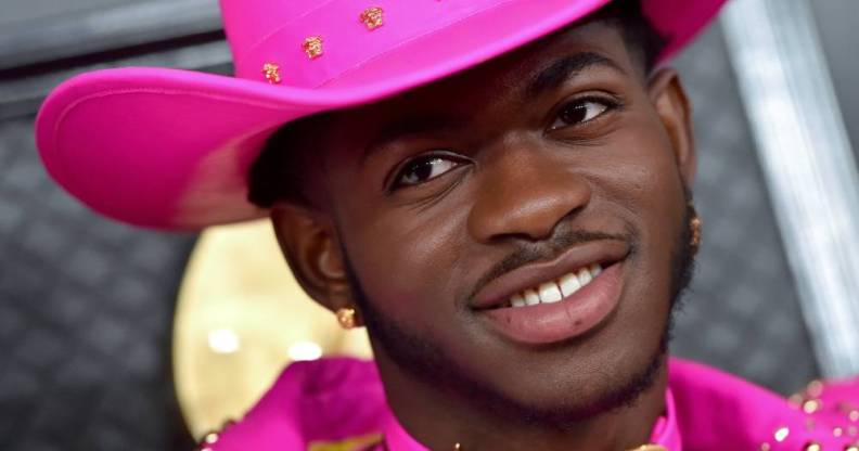 Lil Nas X wearing a hot pink outfit as he attends the 62nd Annual GRAMMY Awards