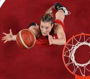 Kim Mestdagh grabbing the basketball at the Olympics