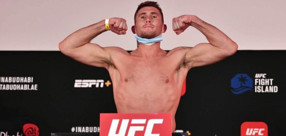 Darren Till poses during a UFC weigh-in.