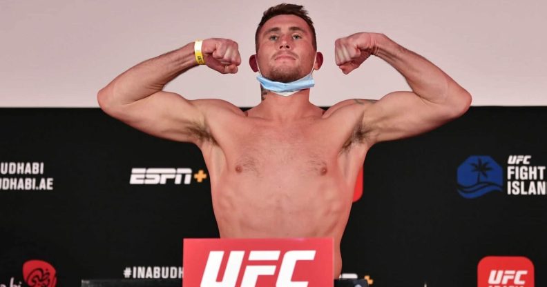 Darren Till poses during a UFC weigh-in.