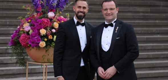 German health minister Jens Spahn (R) and his husband Daniel Funke