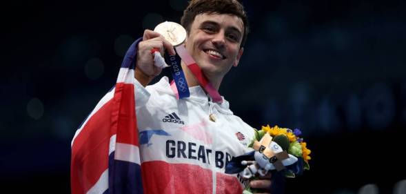 Team GB's Tom Daley poses with bronze medal at the Tokyo 2020 Olympic Games