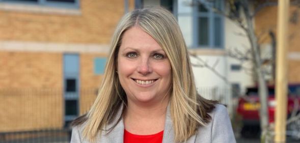 Hannah Blythyn poses with a red rosette