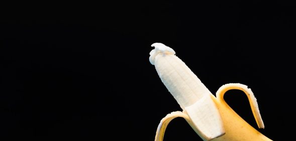 A banana, half peeled