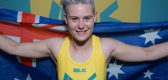 Robyn Lambird poses with an Australian flag