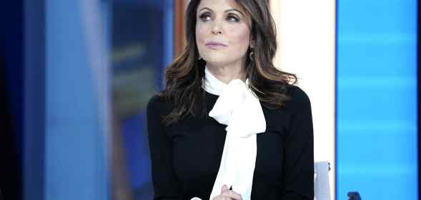 Bethenny Frankel in a white shirt and black blazer