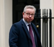 Michael Gove, Conservative Party MP for Surrey Heath, walks along Downing Street