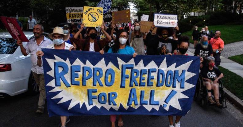 Activists march to US supreme court justice Brett Kavanaugh's house, following the court's decision to uphold Texas' stringent abortion law.