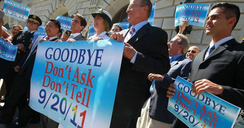 Local leaders and former military members hold a banner during a conference marking the end of "Don't Ask, Don't Tell" on 20 September 2011