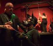 Pup EKO role-plays an obedient dog at a dungeon party.