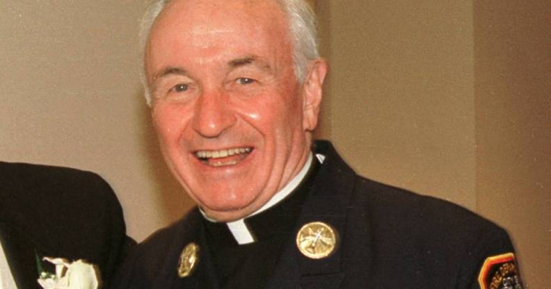 Fire Department chaplain Mychal Judge smiles for a photograph 28 July 2001, Judge was killed in the 9/11 attack later that year