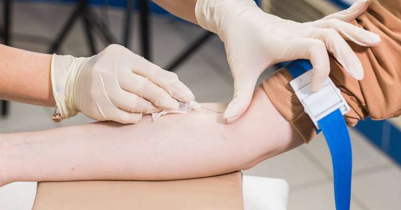 Close-up of doctor taking blood