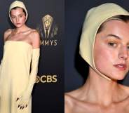 Emma Corrin at the Emmys wearing a yellow Miu Miu sheath dress, matching bonnet and sharp claws poking through long gloves