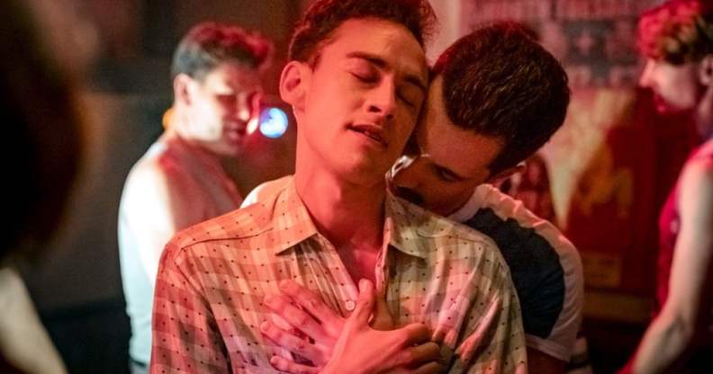 Olly Alexander in It's a Sin, embracing a man