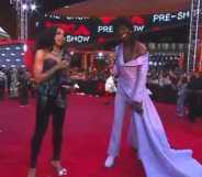 Lil Nas X in a lilac gown and MTV's red carpet host Jamila Mustafa