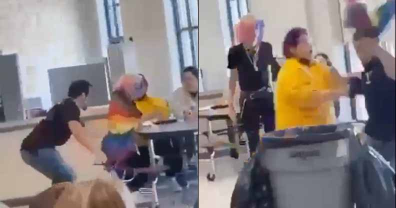A student wrapped in a Pride flag is tugged out of a chair