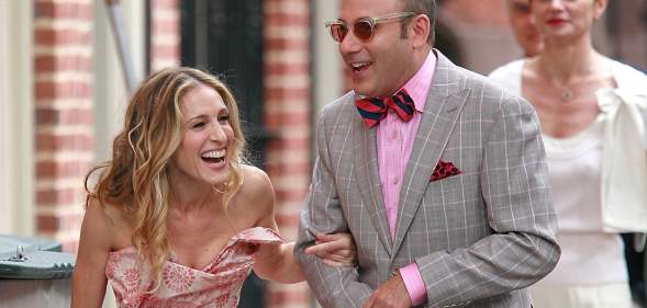 Willie Garson and Sarah Jessica Parker on the set of Sex and the City, laughing