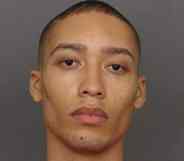 Christian A Smith has his picture taken at Salem County Correctional Facility