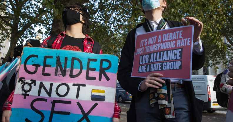 Transgender Action Block activists and supporters protest outside the first annual conference of the LGB Alliance at the Queen Elizabeth II Centre on 21st October 2021