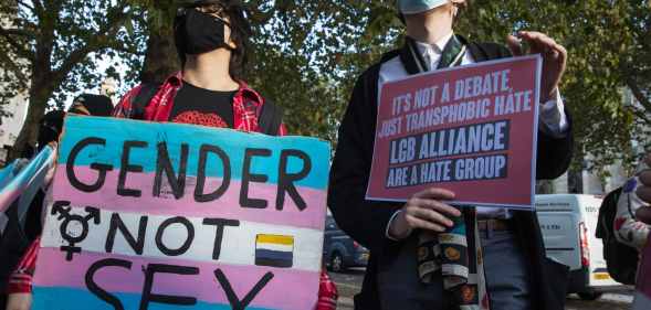 Transgender Action Block activists and supporters protest outside the first annual conference of the LGB Alliance at the Queen Elizabeth II Centre on 21st October 2021