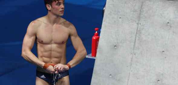Tom Daley of Team Great Britain looks on in the Men's 10m Platform Final on day fifteen of the Tokyo 2020 Olympic Games at Tokyo Aquatics Centre on August 07, 2021 in Tokyo, Japan.