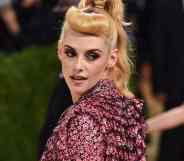Kristen Stewart attends the Costume Institute Benefit at the Metropolitan Museum of Art in a gorgeous pink and black top