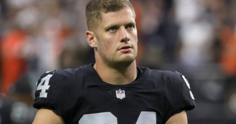 Carl Nassib exits the field after the Las Vegas Raiders lost to the Chicago Bears