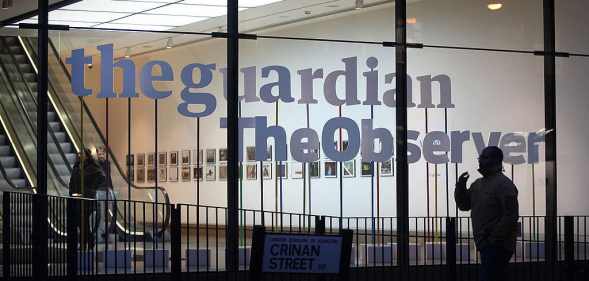 A picture of The Guardian and The Observer logos at the newspapers' London offices