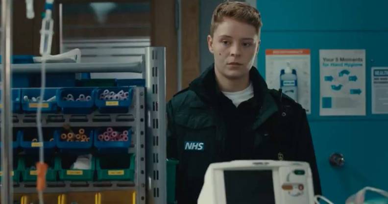 A still from Casualty showing Sah, a new recruit to the paramedic team. Sah is Casualty's first trans recurring character, and they are played by Arin Smethurst.