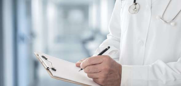 Doctor with clipboard