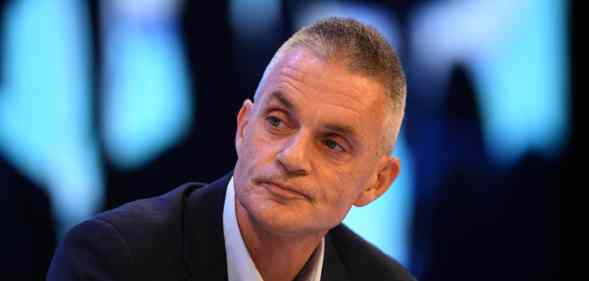 Tim Davie, CEO of BBC, looks to the right