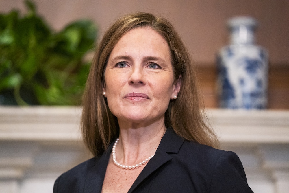 A photo of supreme court justice Amy Coney Barrett wearing a black suit jacket