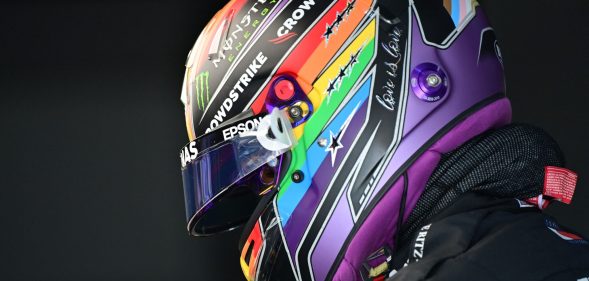 Mercedes' British driver Lewis Hamilton is pictured in the pits during the third practice session ahead of the Qatari Formula One Grand Prix.