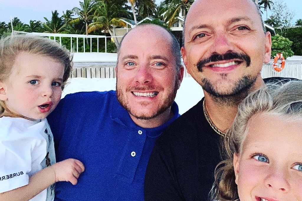 Michael Johnson Ellis with his husband Wes and their two children