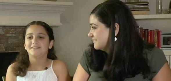 Lisa Stanton and her daughter smile during an interview for KPRC Click2Houston