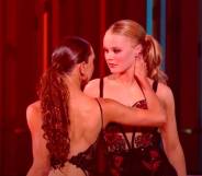JoJo Siwa stars at her professional dancing partner Jenna Johnson during a rumba on Dancing with the Stars