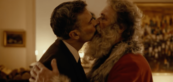 Santa kissing his boyfriend