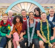 The It's a Sin cast posing alongside the GBBO judges and hosts