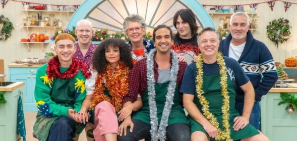 The It's a Sin cast posing alongside the GBBO judges and hosts