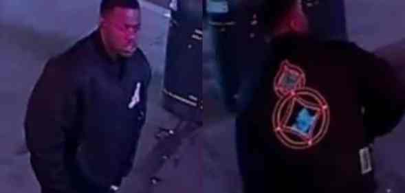 CCTV footage of a man in a black graphic jacket involved in a homophobic attack
