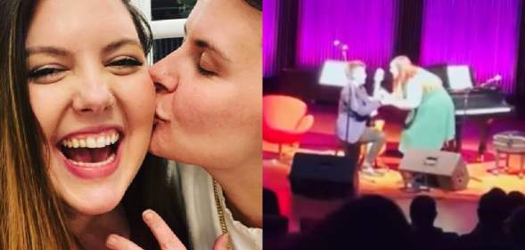 Mary Lambert showing her engagement ring off while her fiancée kisses her on the cheek