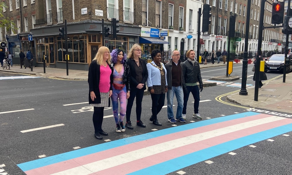 Local Labour councillors stand in front of the new trans crossing in Camden, Londo