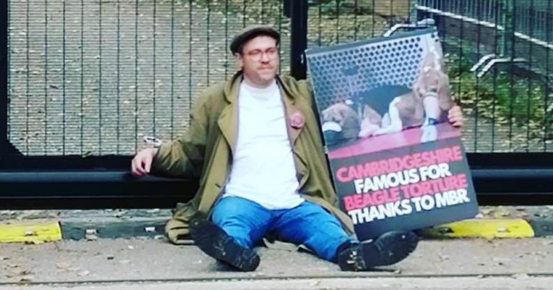 Will Young handcuffed to the gates of a puppy farm