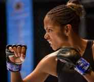 Halle Berry in boxing gloves, snarling