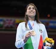 Bronze medallist Italy's Irma Testa poses on the podium with her medal